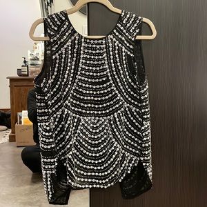 Parker size small sleeveless disco ball sequin and leather top. Good condition.